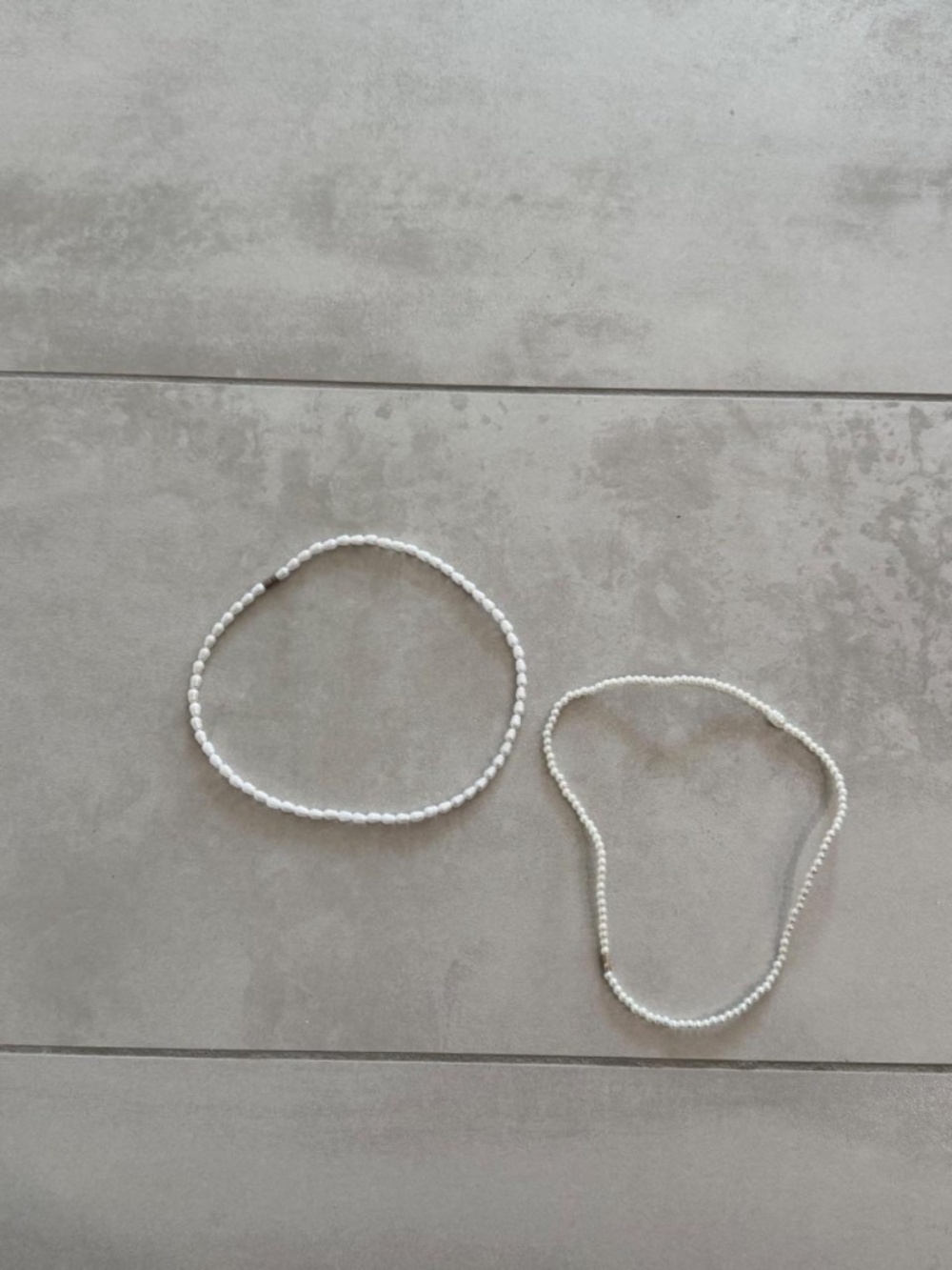 2 faux pearl necklaces